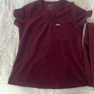 Gently used figs scrubs. Jogger style bottoms. Both size small